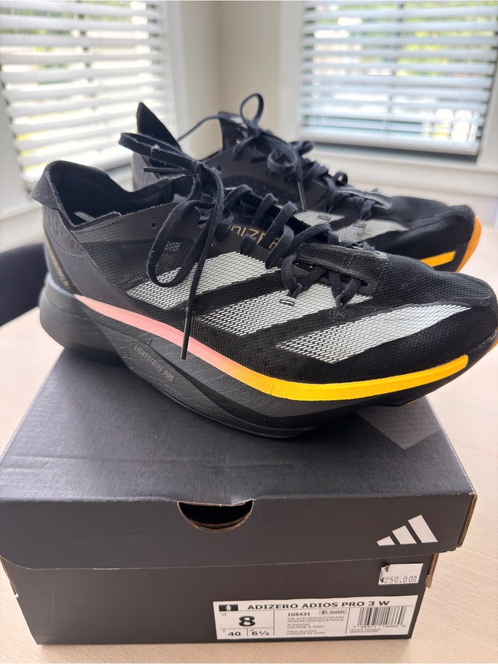 adidas Adizero Women’s Black Running Shoes with Yellow and Pink Accents